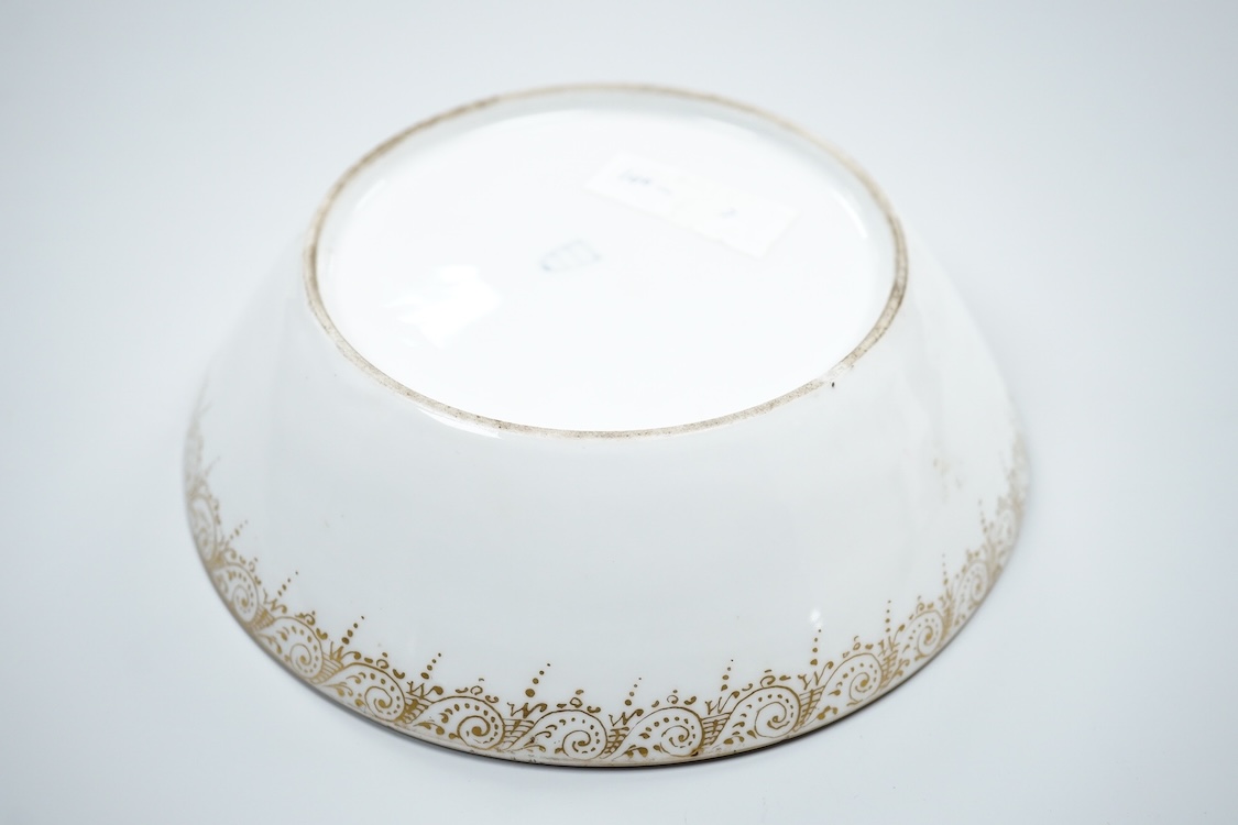 A 19th century Vienna saucer, hand painted with two figures beneath a tree, 15cm in diameter